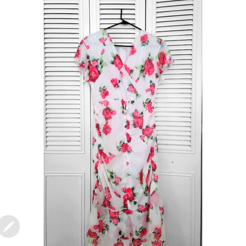 Floral midi dress with ruffled sleeves, fits size 10-12